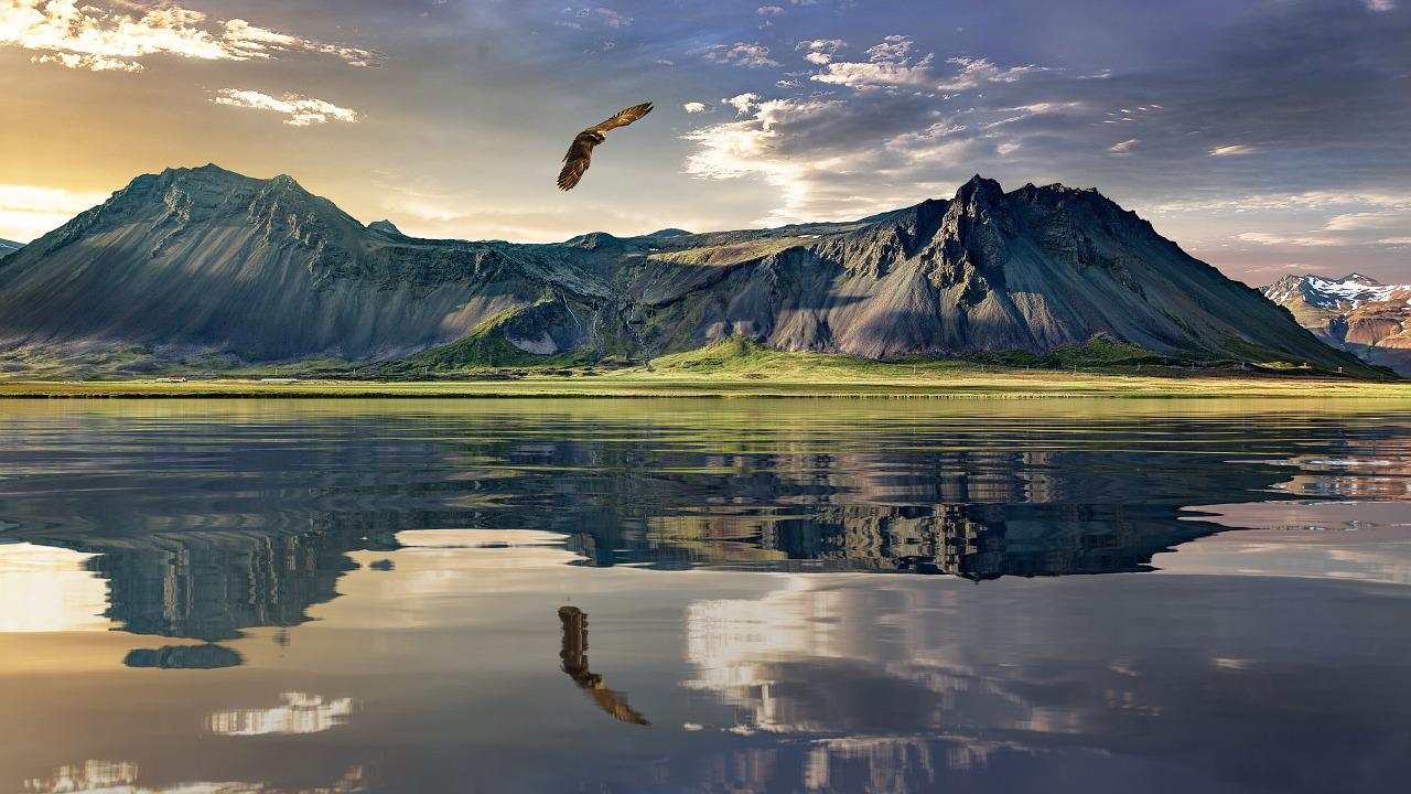 An image of a distant land across water